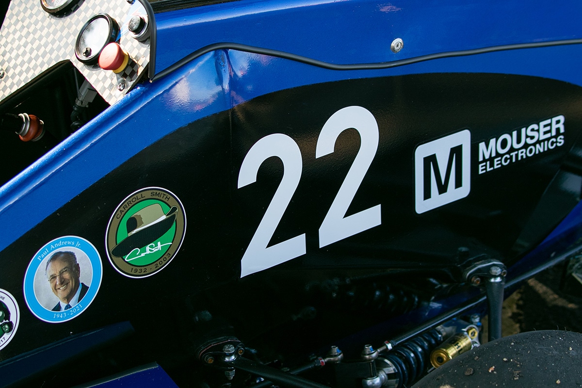 Close-up picture of a UTA racecar. the car has a big '22' printed on it next to a Mouser Electronics logo - opens in a new tab